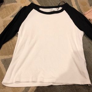 white tee with black sleeves